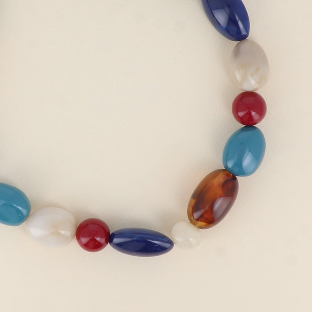 Nolwena necklace - on cord, round and oval resin beads