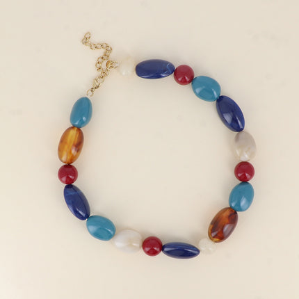 Nolwena necklace - on cord, round and oval resin beads