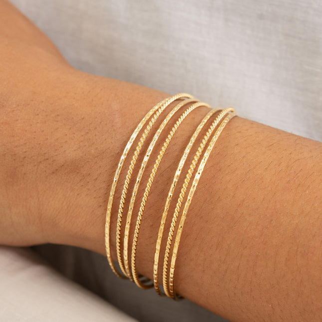 Weekly bangle - 7 textured rings