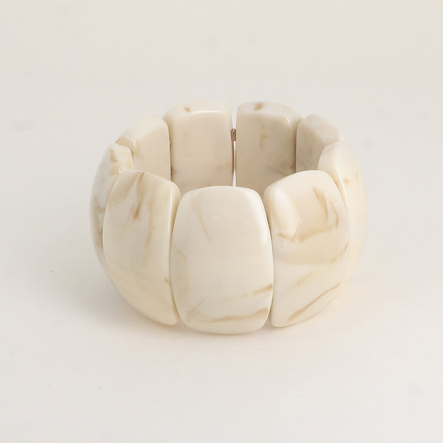 Bracelet élastique - perles ovales larges incurvées en résine 42mm