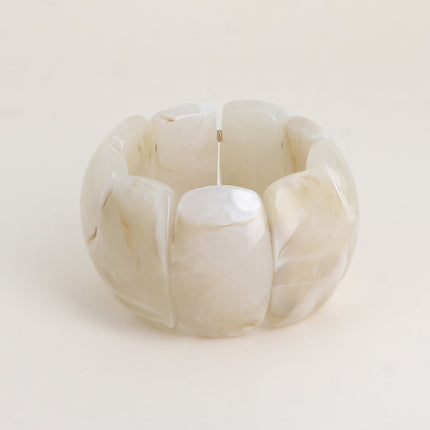 Bracelet élastique - perles ovales larges incurvées en résine 42mm