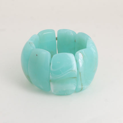 Bracelet élastique - perles ovales larges incurvées en résine 42mm