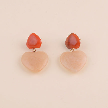 Boucles pendantes - deux coeurs en résine
