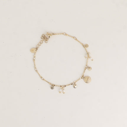 Bracelet - coquillage, pastilles texturées, perles nacrées