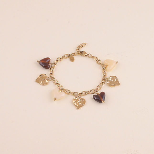 Bracelet - breloques coeurs en résine