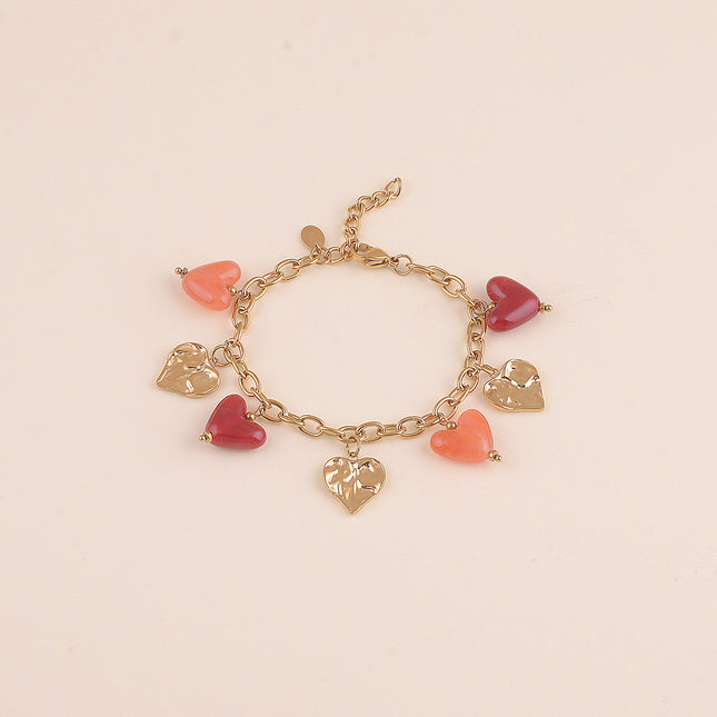 Bracelet - breloques coeurs en résine