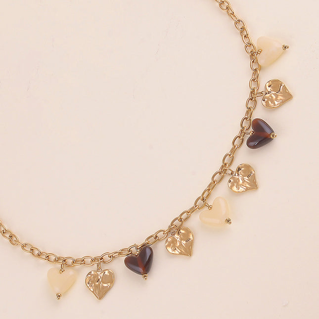 Collier - breloques coeurs en résine