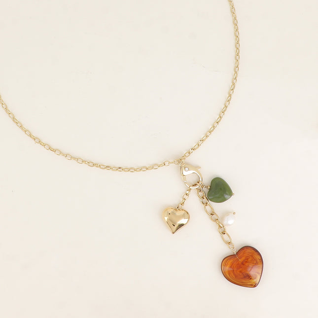Collier Y - mousqueton avec cristal et coeur, breloques coeurs, perles et résine