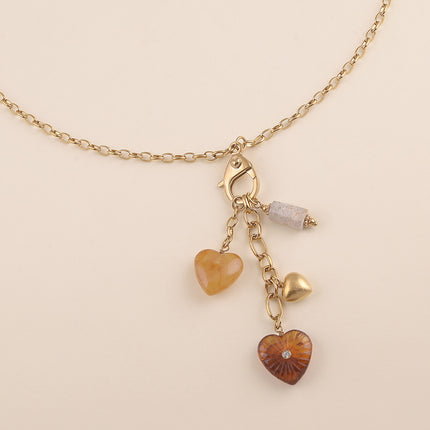 Collier - breloques coeurs en résine