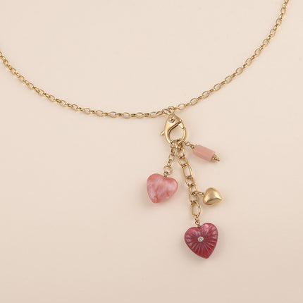 Collier - breloques coeurs en résine