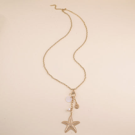 Sautoir - fermoir mousqueton, étoile de mer, coquillae nacré, perle d'eau douce et coquillage