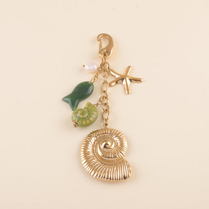 Porte-clé - coquillage, poisson en résine, coquillage escargot en céramique, étoile de mer et perle d'eau douce