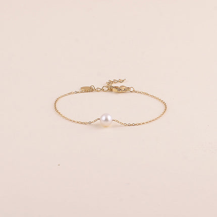 Bracelet - pendentif en perle d'eau douce