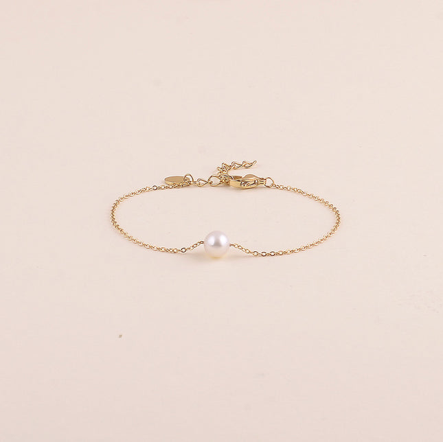 Bracelet - pendentif en perle d'eau douce