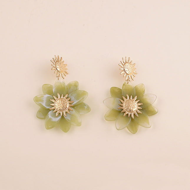 Boucles pendantes - soleil martelé et fleur en résine