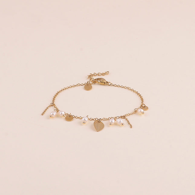 Bracelet - pastilles rondes, perles d'eau douce et pastille feuillage