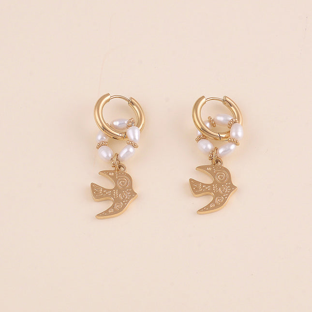 Créoles - anneau de perles d'eau douce et oiseau