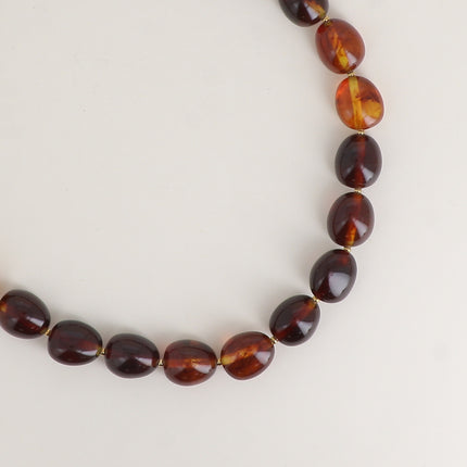 Collier - perles en résine