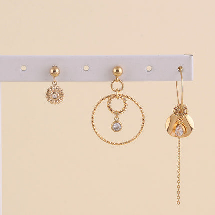 Set de 3 boucles - fleur, pastille ronde ondulée, anneaux torsadés avec cristaux