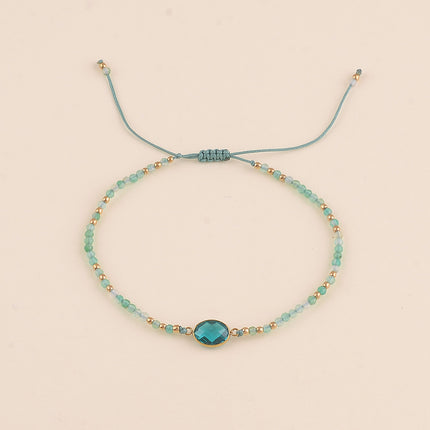 Bracelet sur cordon - fermoir coulissant, pierres naturelles et cristal taillé ovale