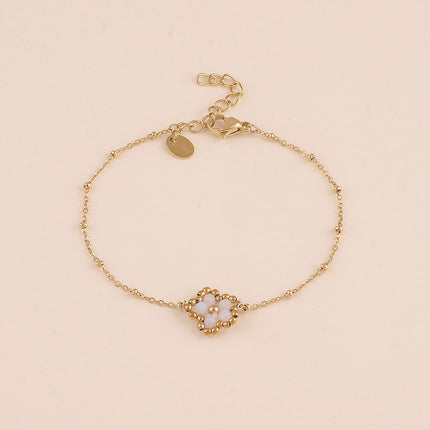 Bracelet - fleur en pierre naturelle et perles rondes