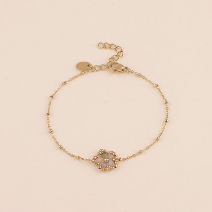 Bracelet - fleur en pierre naturelle et perles rondes
