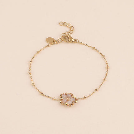 Bracelet - fleur en pierre naturelle et perles rondes