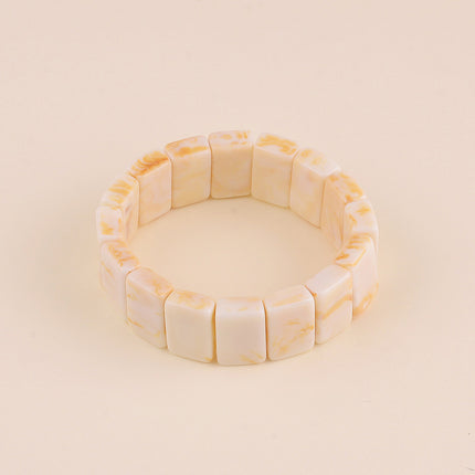 Bracelet élastique - perles rectangulaires en résine colorée
