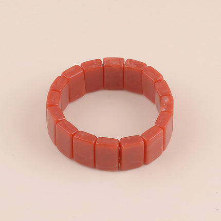 Bracelet élastique - perles rectangulaires en résine colorée
