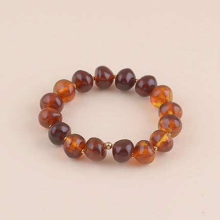 Bracelet élastique - perles ovales et en acier inoxydable