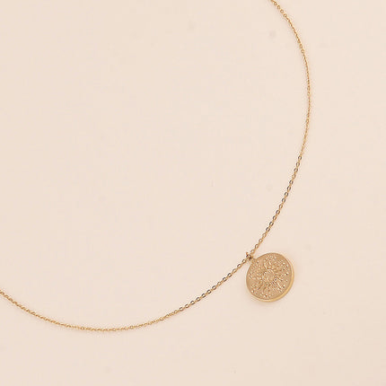 Collier - médaillon rond avec soleil et étoiles