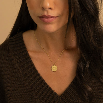 Collier - médaillon rond avec soleil et étoiles