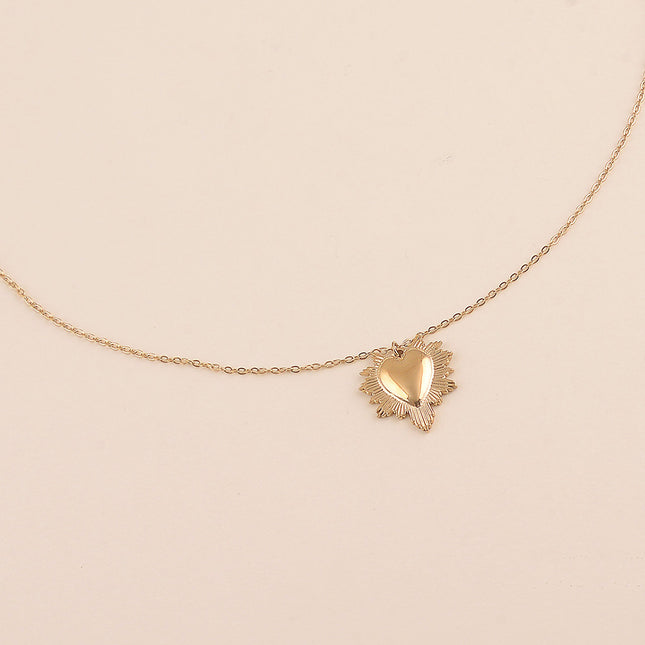 Collier - coeur aux contours étincelants