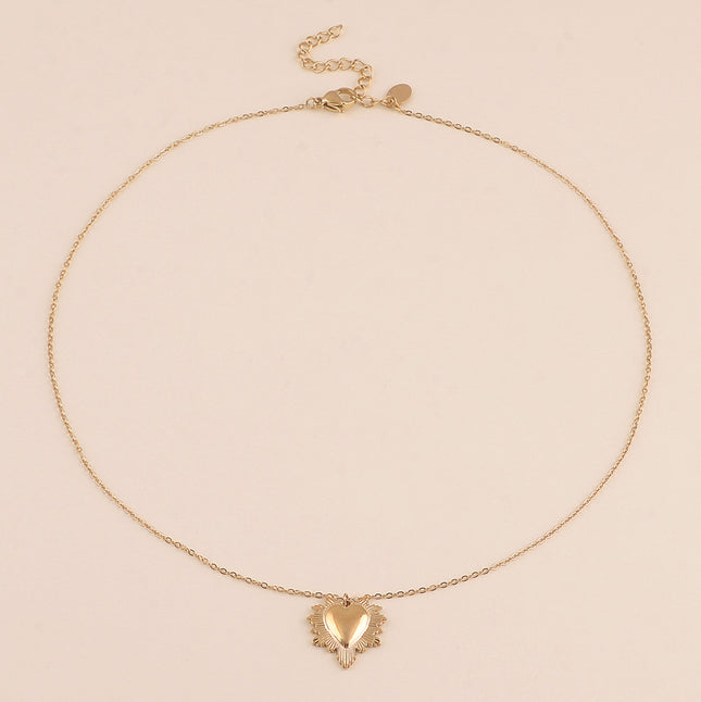 Collier - coeur aux contours étincelants