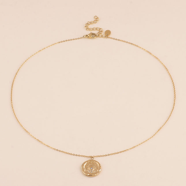 Collier - médaillon rond avec étoile gravée et cristal