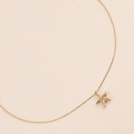 Collier - étoile de mer texturé et cristal