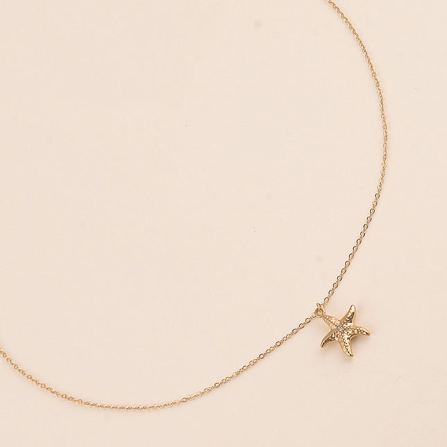 Collier - étoile de mer texturé et cristal