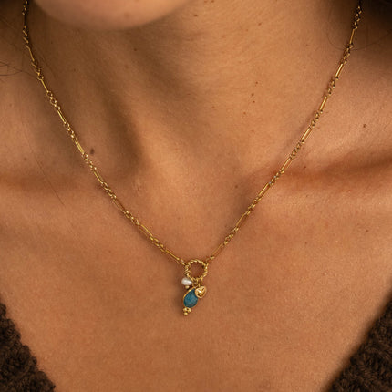 Y-necklace - 1/5 alternating chain, twisted ring, heart, freshwater pearl, and natural stone drop