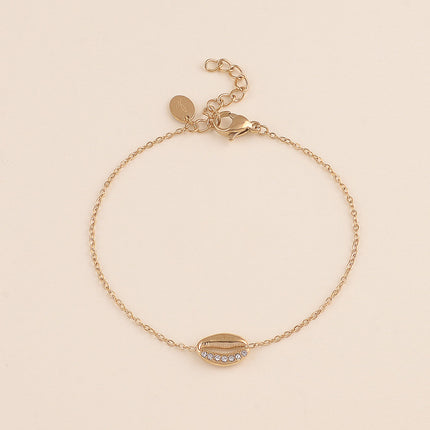 Bracelet - motif cauri avec cristaux