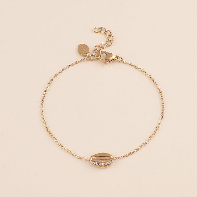 Bracelet - motif cauri avec cristaux