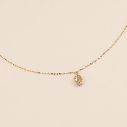 Collier - motif cauri et cristaux