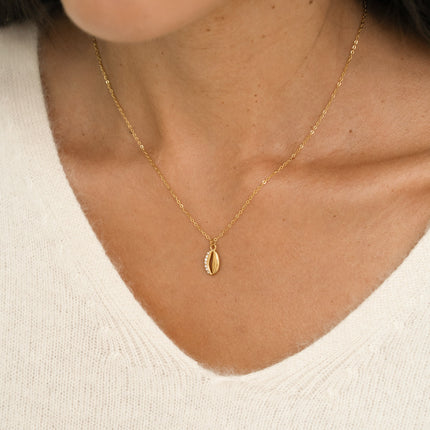 Collier - motif cauri et cristaux