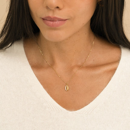 Collier - motif cauri et cristaux