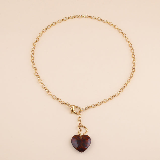Collier - coeur en résine léopard