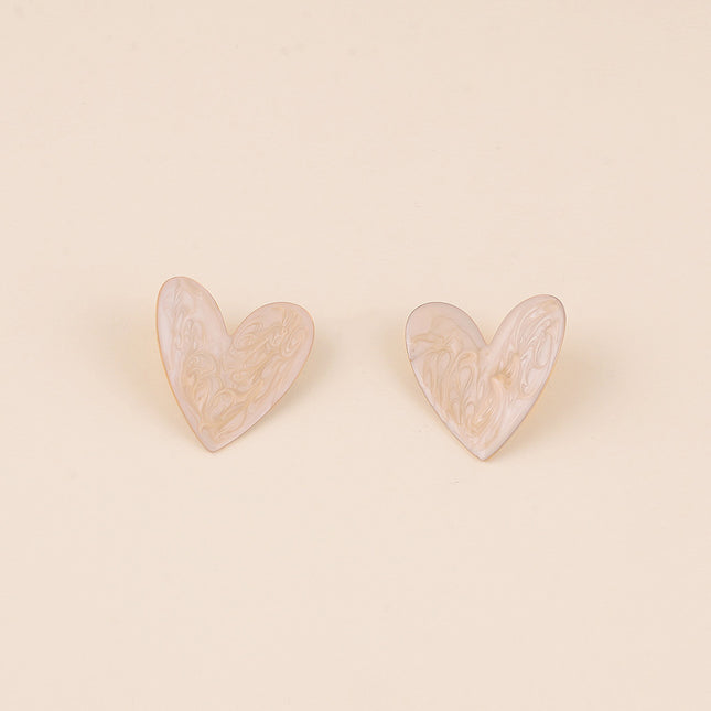 Boucles puces - coeur plat légèrement ondulé avec émail reflet nacré