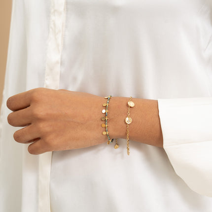 Bracelet - glass beads and round charms