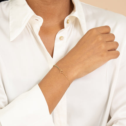 Bracelet - fil tressé, pendentif double trèfle ajouré