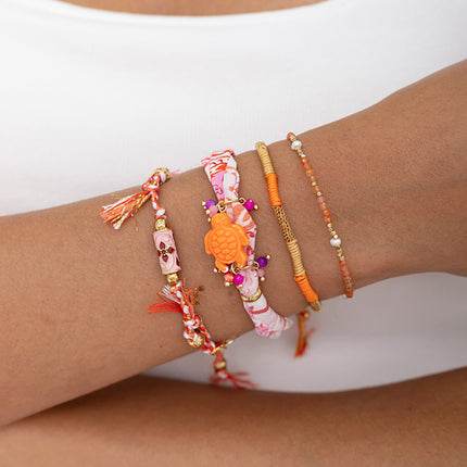 Cord bracelet - floral enamel tube bead