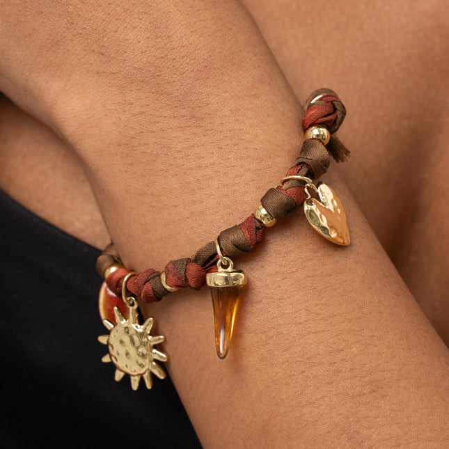 Bracelet - ribbon fabric, enameled ceramic bead, sun, resin horn, textured heart