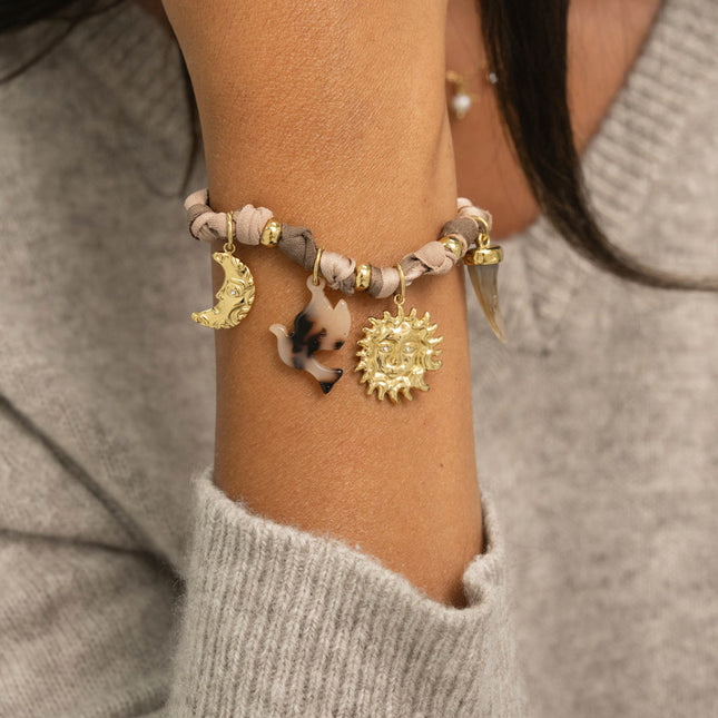 Bracelet - ribbon fabric, moon, sun, resin horn, flower